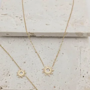 Collier et bracelet dorés femme en acier inoxydable avec pendentif soleil ajouré