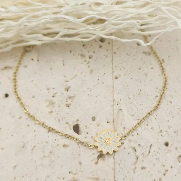 Bracelet enfant marguerite en acier doré avec fleur colorée blanc ajustable pour petite fille 4 à 9 ans
