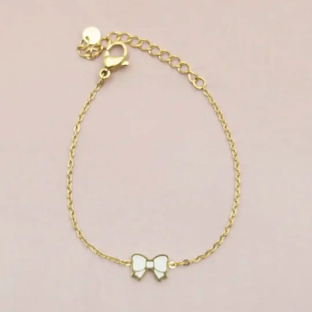 Bracelet enfant en acier doré avec noeud colorée ajustable pour petite fille 4 à 9 ans