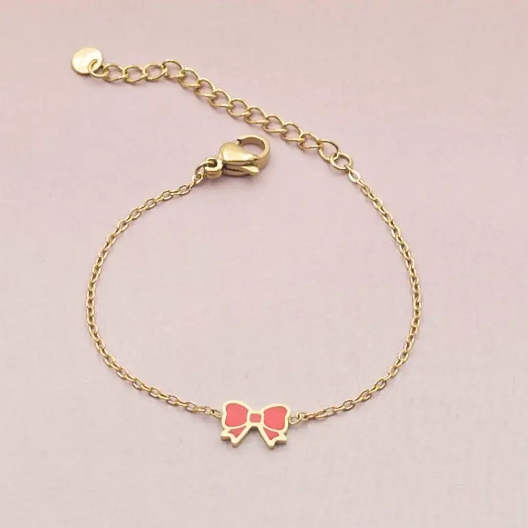 Bracelet enfant en acier doré avec noeud colorée fushia ajustable pour petite fille 4 à 9 ans