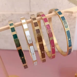 Bracelets jonc en acier doré avec émail coloré collection Solaris disponibles en plusieurs couleurs