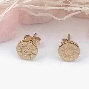 oucles d’oreilles clous motif soleil en acier inoxydable doré