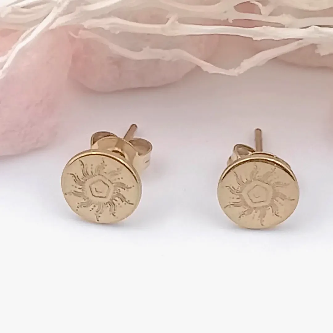 oucles d’oreilles clous motif soleil en acier inoxydable doré