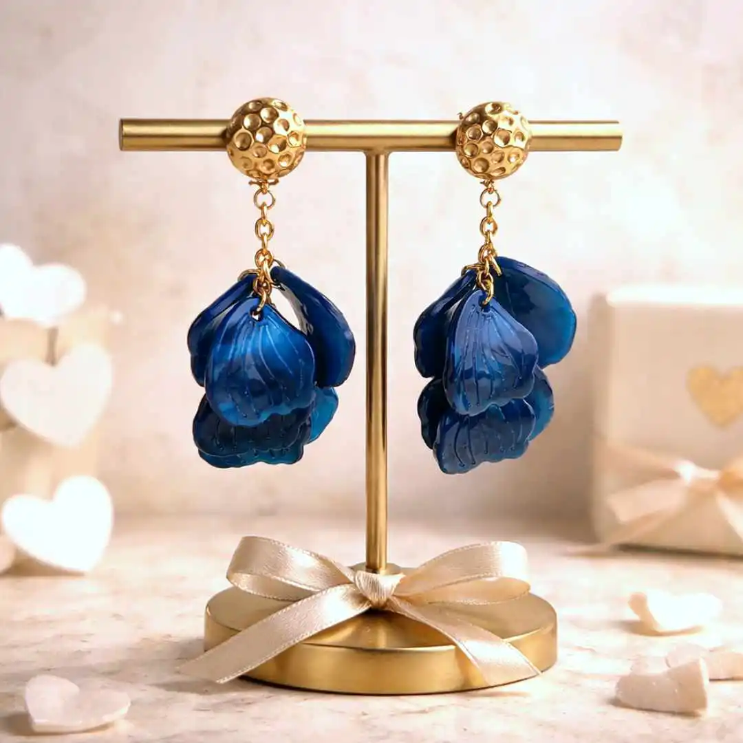 Boucles d’oreilles pendantes en résine bleu et acier doré, pampilles en forme de feuilles