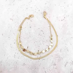 Bracelet double chaîne dorée pour femme avec maillons en forme de losange
