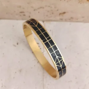 Bracelet jonc en acier doré avec émail noir et motifs triangles géométriques pour femme