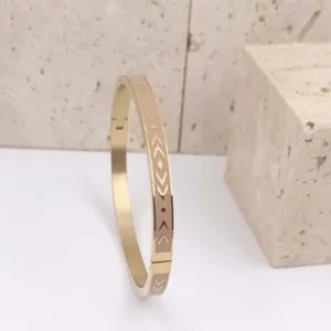 Bracelet jonc en acier doré et émail rose bonbon