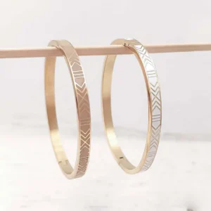 Bracelets joncs rigides en acier doré avec motifs géométriques gravés dorés