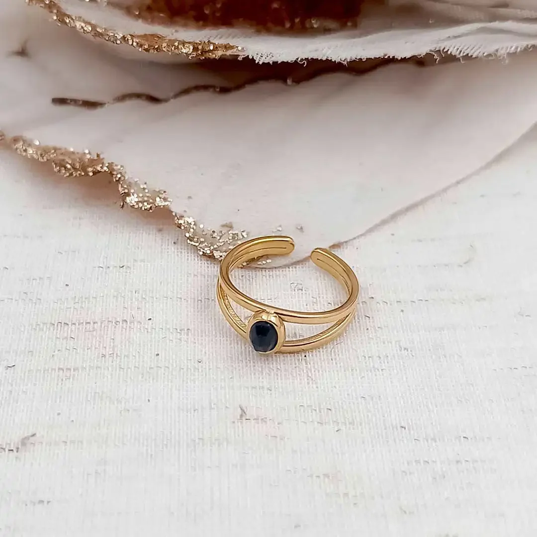 Bague ajustable en acier inoxydable doré avec pierre ovale noire