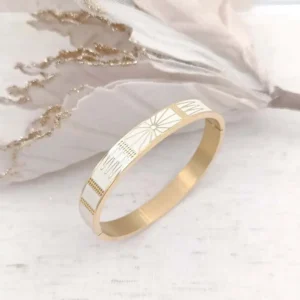 Bracelets joncs rigides en acier doré avec motifs géométriques soleil gravés dorés