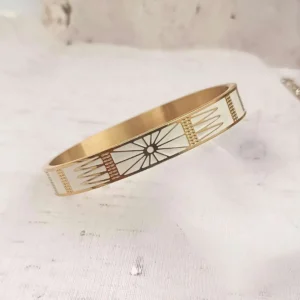 Bracelets joncs rigides en acier doré avec motifs géométriques soleil gravés dorés