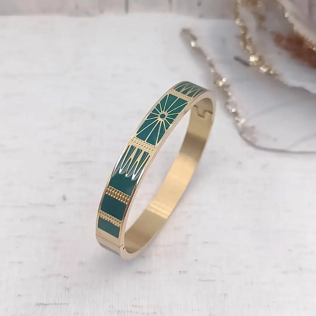 Bracelets joncs rigides en acier doré avec motifs géométriques soleil gravés dorés