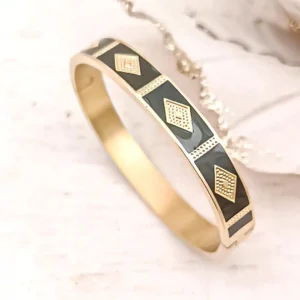 Bracelet jonc rigide large en acier doré avec motifs géométriques losanges gravés dorés