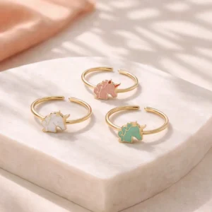 Bagues enfant licorne en acier inoxydable doré ajustables blanc rose bleu