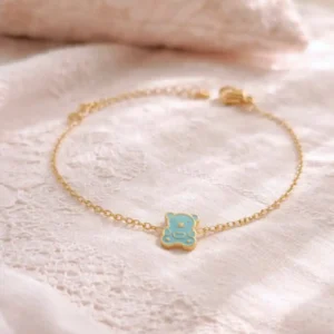 Bracelet enfant en acier inoxydable doré avec ourson bleu émaillé, bijou tendance et résistant