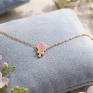 Bracelet enfant acier hypoallergénique sucette rose pour fille