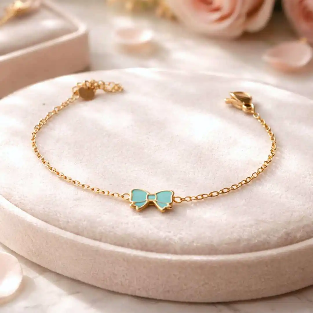 Bracelet enfant en acier doré avec noeud colorée bleu ajustable pour petite fille 4 à 9 ans