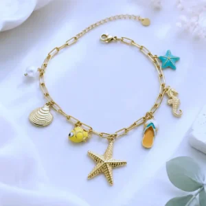 Bracelet acier inoxydable doré breloques étoile de mer, coquillage, hippocampe et poisson