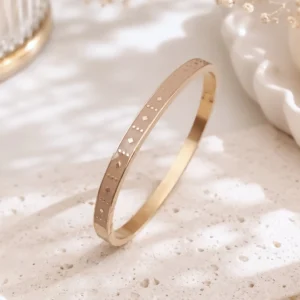 Bracelet jonc femme en acier inoxydable doré émaillé beige rosé avec motifs géométriques