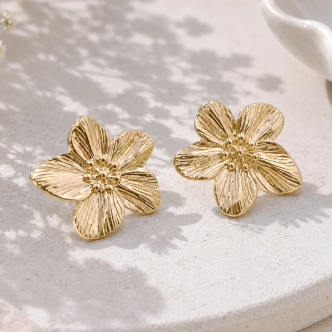 Boucles d'oreilles fleur dorées en acier inoxydable