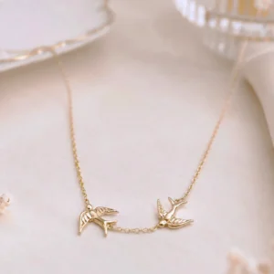 collier acier femme hirondelles doré en acier inoxydable bijou fin