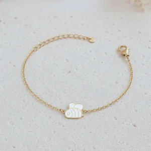 Bracelet enfant abeille émaillée blanche en acier inoxydable doré
