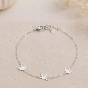 Bracelet hirondelle en acier inoxydable argenté avec trois hirondelles