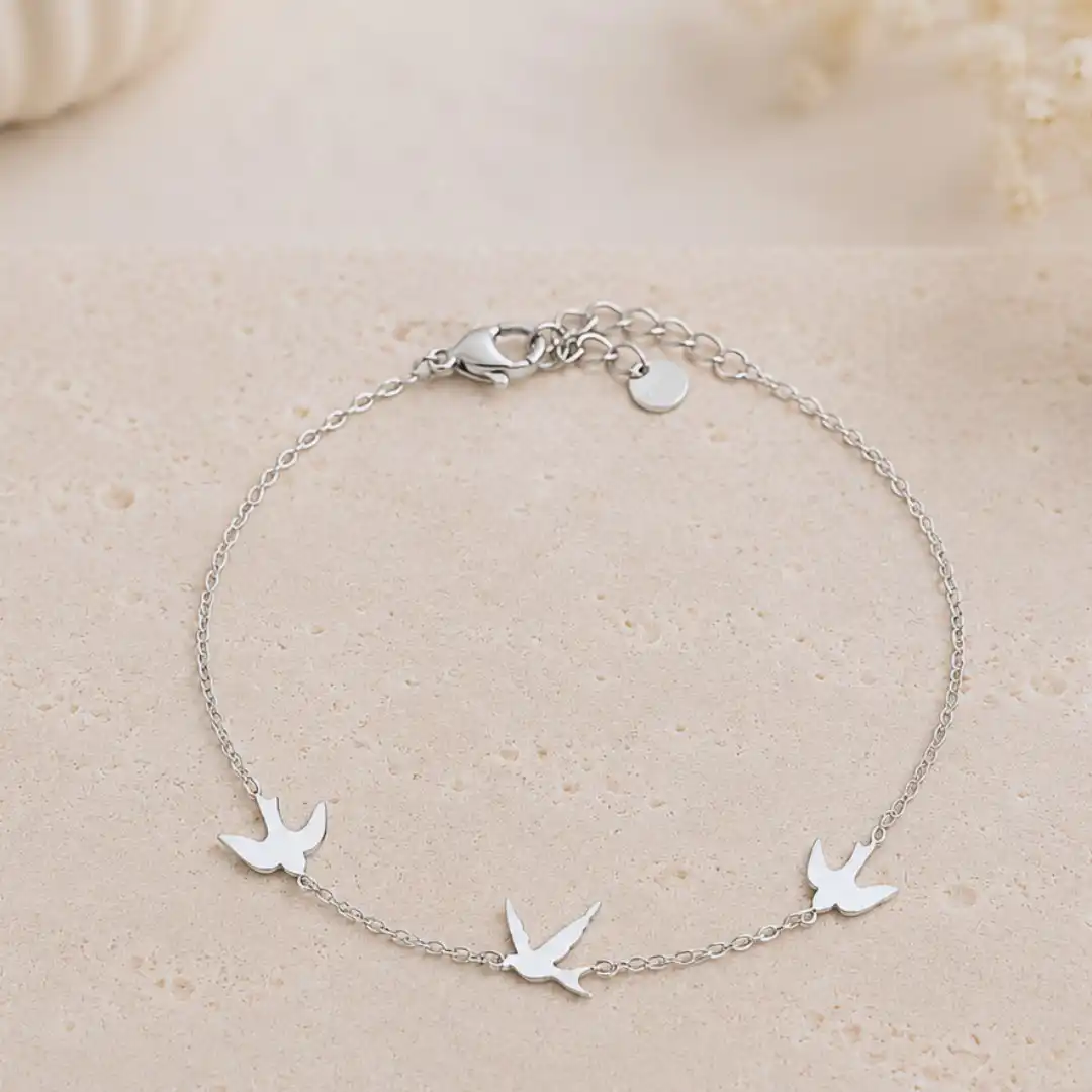 Bracelet hirondelle en acier inoxydable argenté avec trois hirondelles