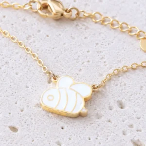 Pendentif abeille blanc sur collier enfant en acier doré
