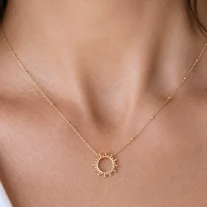 collier acier femme soleil dorée
