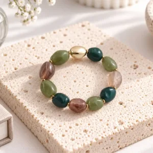 Bracelet élastique en résine vert bleu et marron avec acier doré