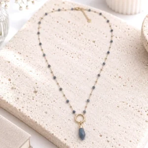 collier acier long perles bleues pendentif doré